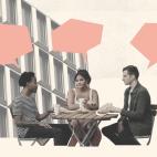 Coworkers talking at cafe