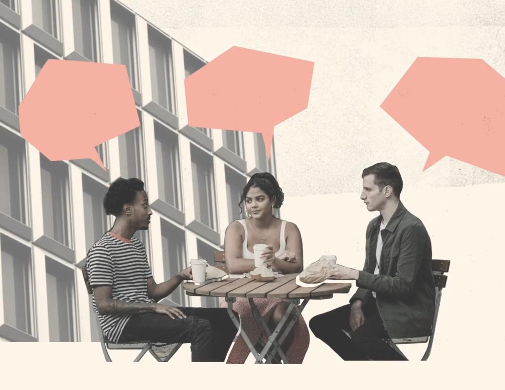 Coworkers talking at cafe
