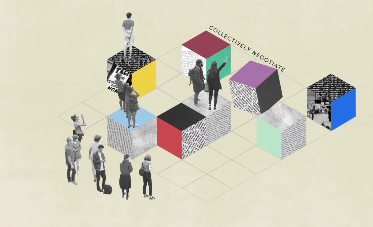 People in front of colourful cubes
